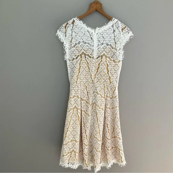 Adelyn Rae, size XS, sleeveless gold, and white dress - Picture 2 of 7